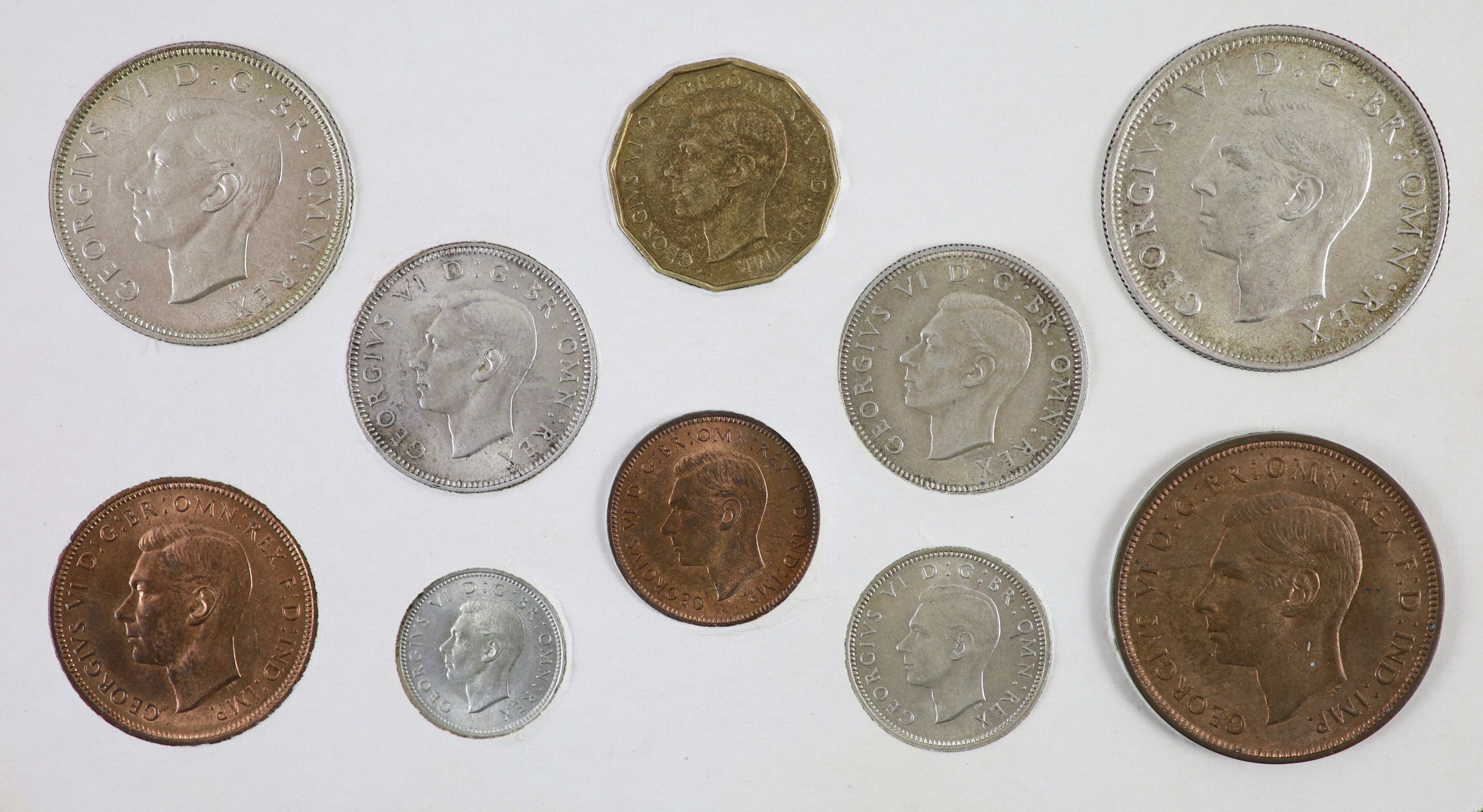 George VI specimen set of eleven coins, 1937, first coinage, comprising Crown, halfcrown, florin, ‘English’ & ‘Scottish’ shillings, sixpence, brass threepence, silver threepence, about EF, the penny, halfpenny and farthi